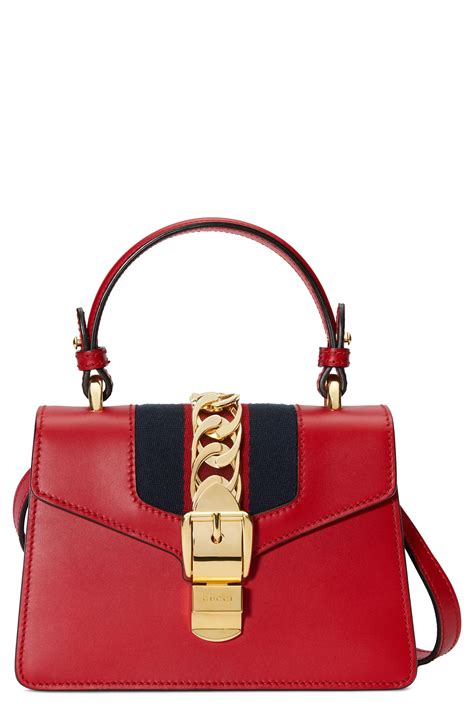 gucci mini sylvie top handle leather shoulder bag|gucci mini handle bag.